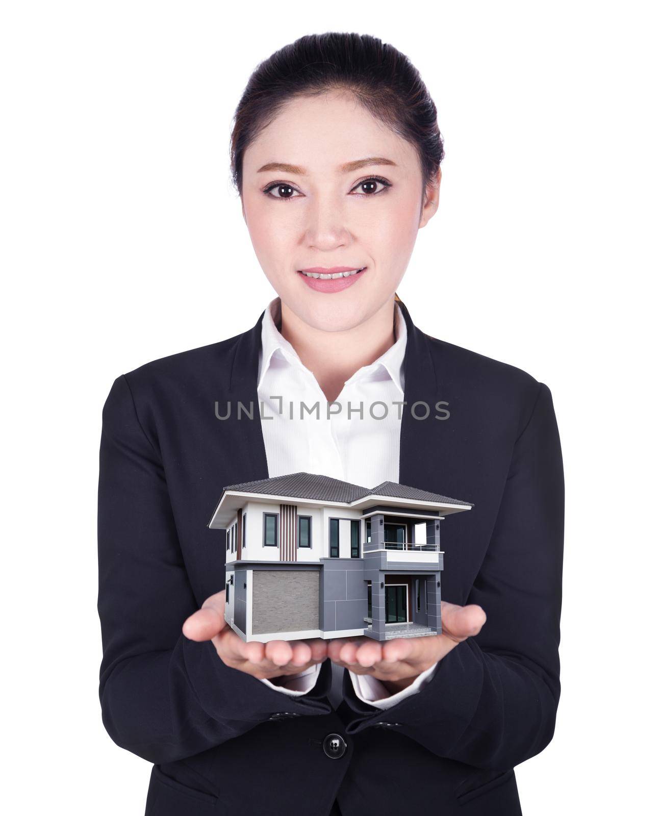 modern home in business woman hand isolated on white background