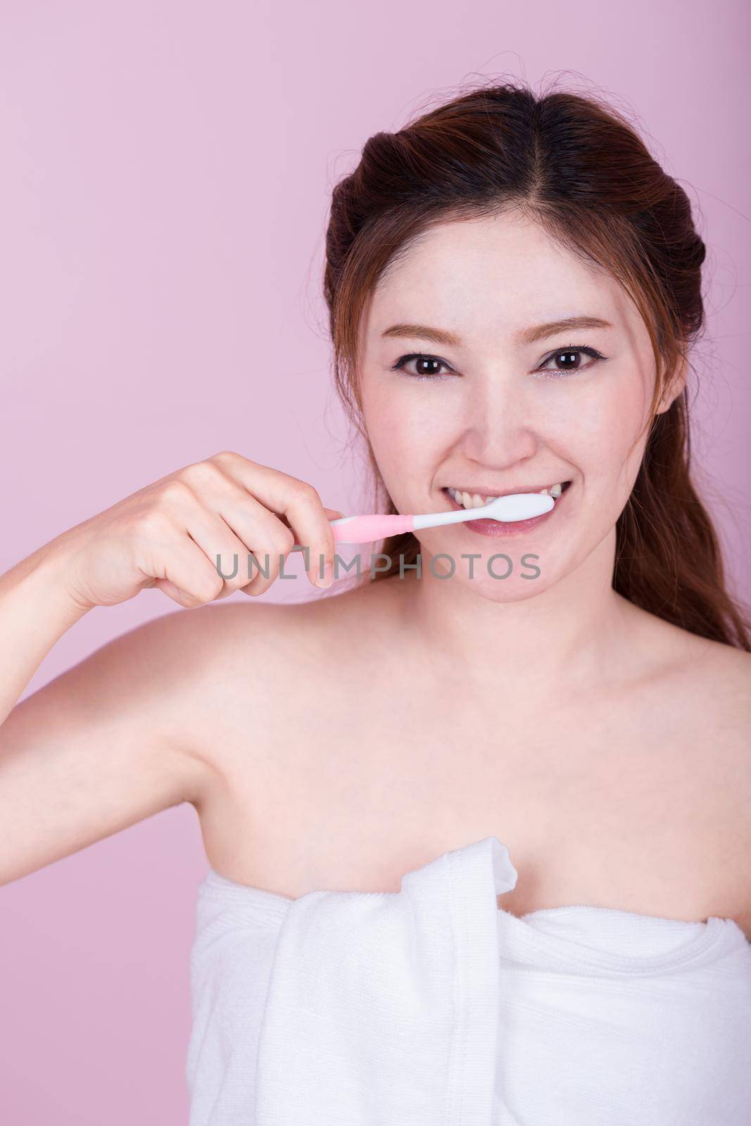 happy beautiful woman brushing her teeth by geargodz