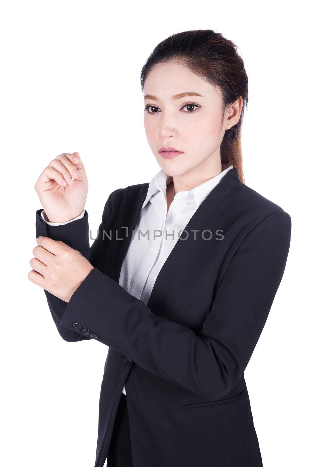business woman in black suit is dressing up isolated on white background
