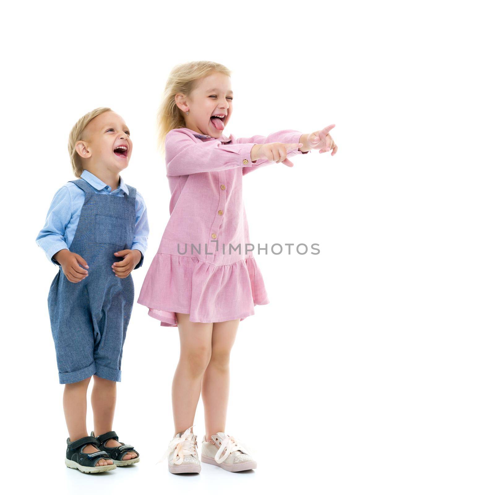 Wind blows on boy and girl.Brother and sister, girl and boy rejoices in the wind that blows in their face. Concept game, happy childhood. Isolated on white background.