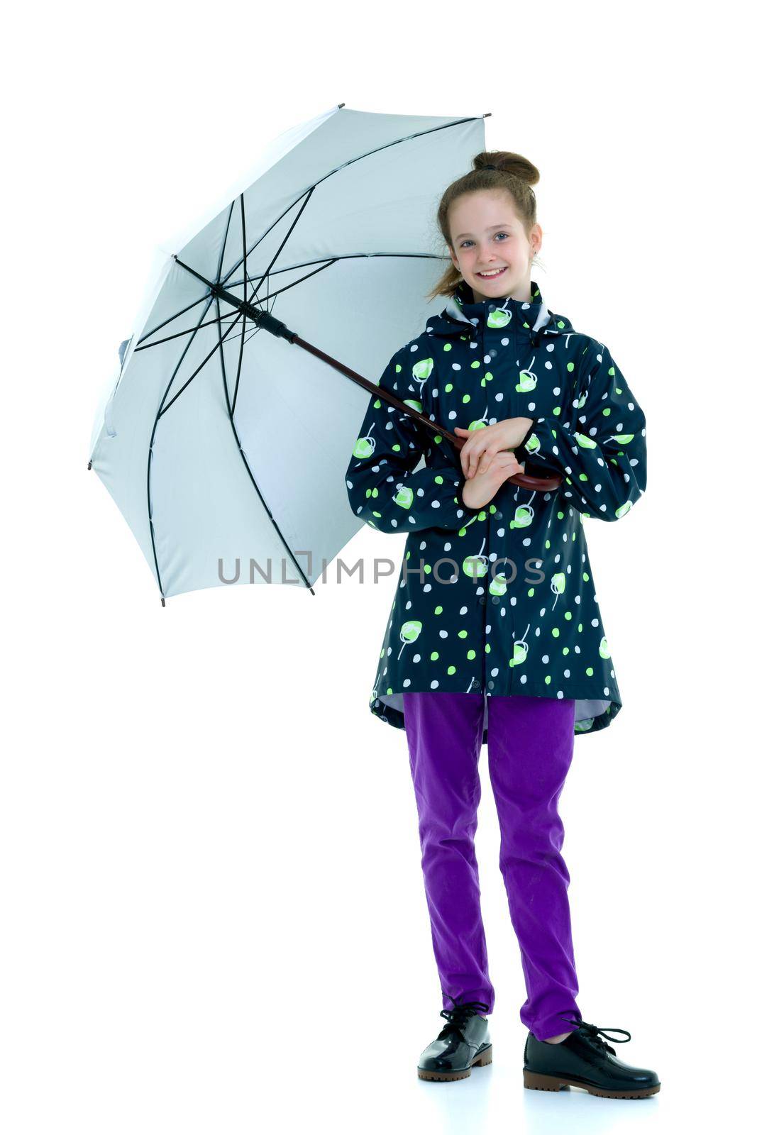 Beautiful little girl with umbrella. Concept of weather, climate change. Isolated on white background