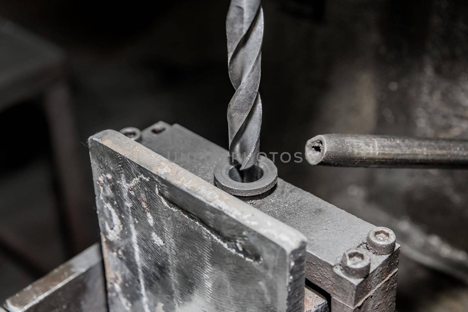 Drill close-up for metal and iron drilling industrial work tool by AYDO8