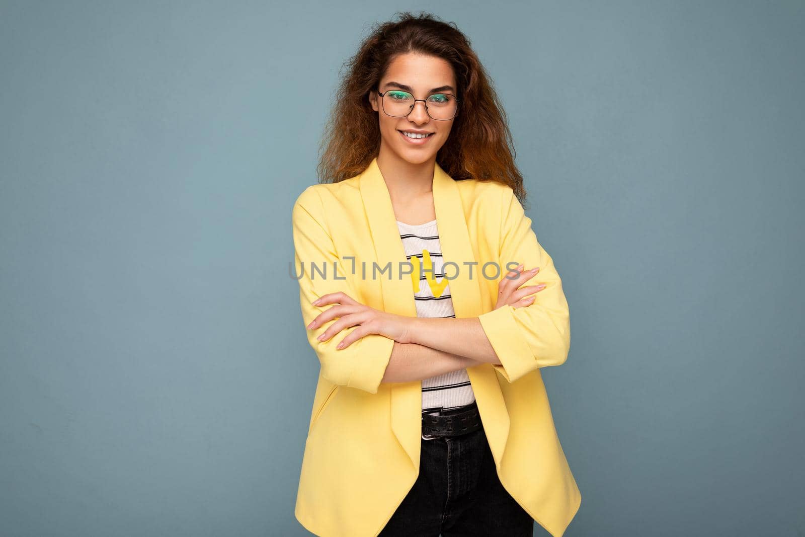 Photo of beautiful positive smiling adult woman wearing stylish clothes standing isolated on colorful background with copy space looking at camera by TRMK