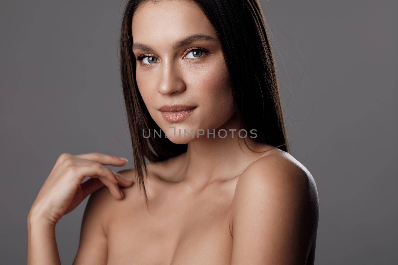 Young pretty woman portrait in studio. High quality photo