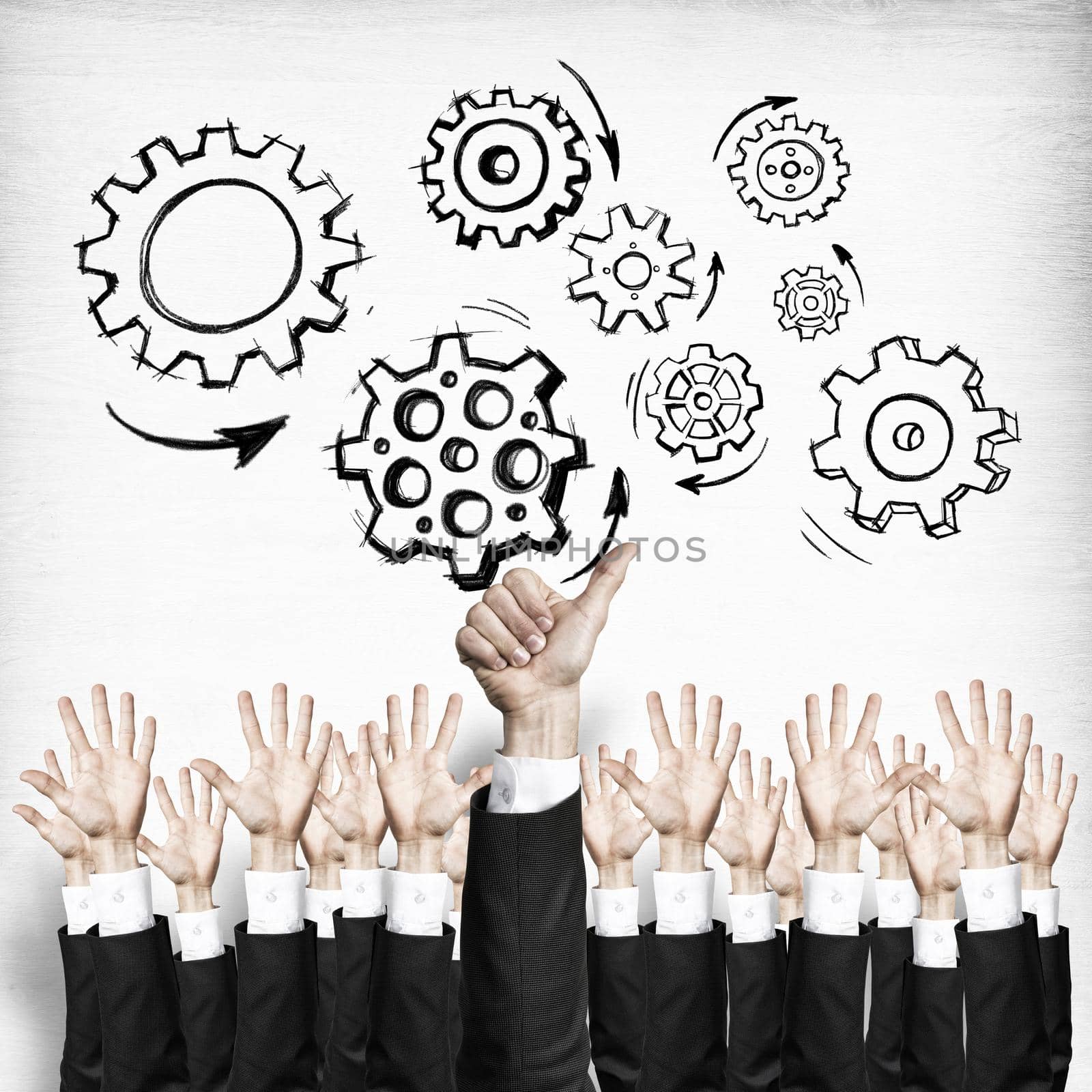 Group of hands of businesspeople showing gestures on wooden background