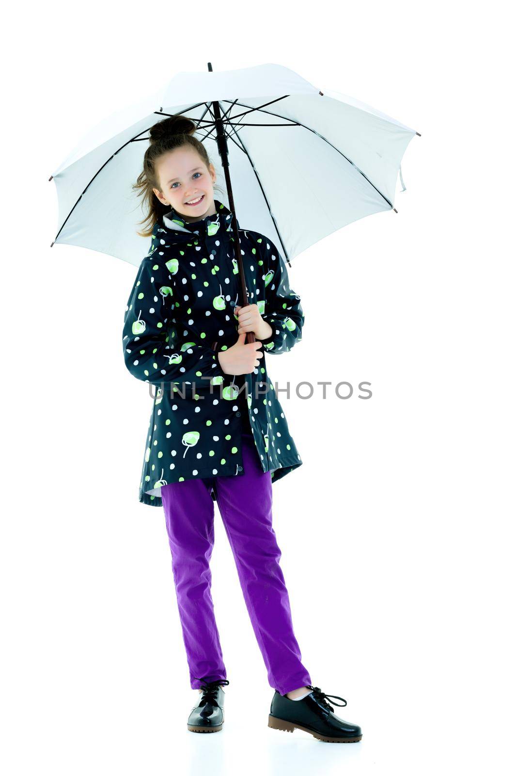 Beautiful little girl with umbrella. Concept of weather, climate change. Isolated on white background