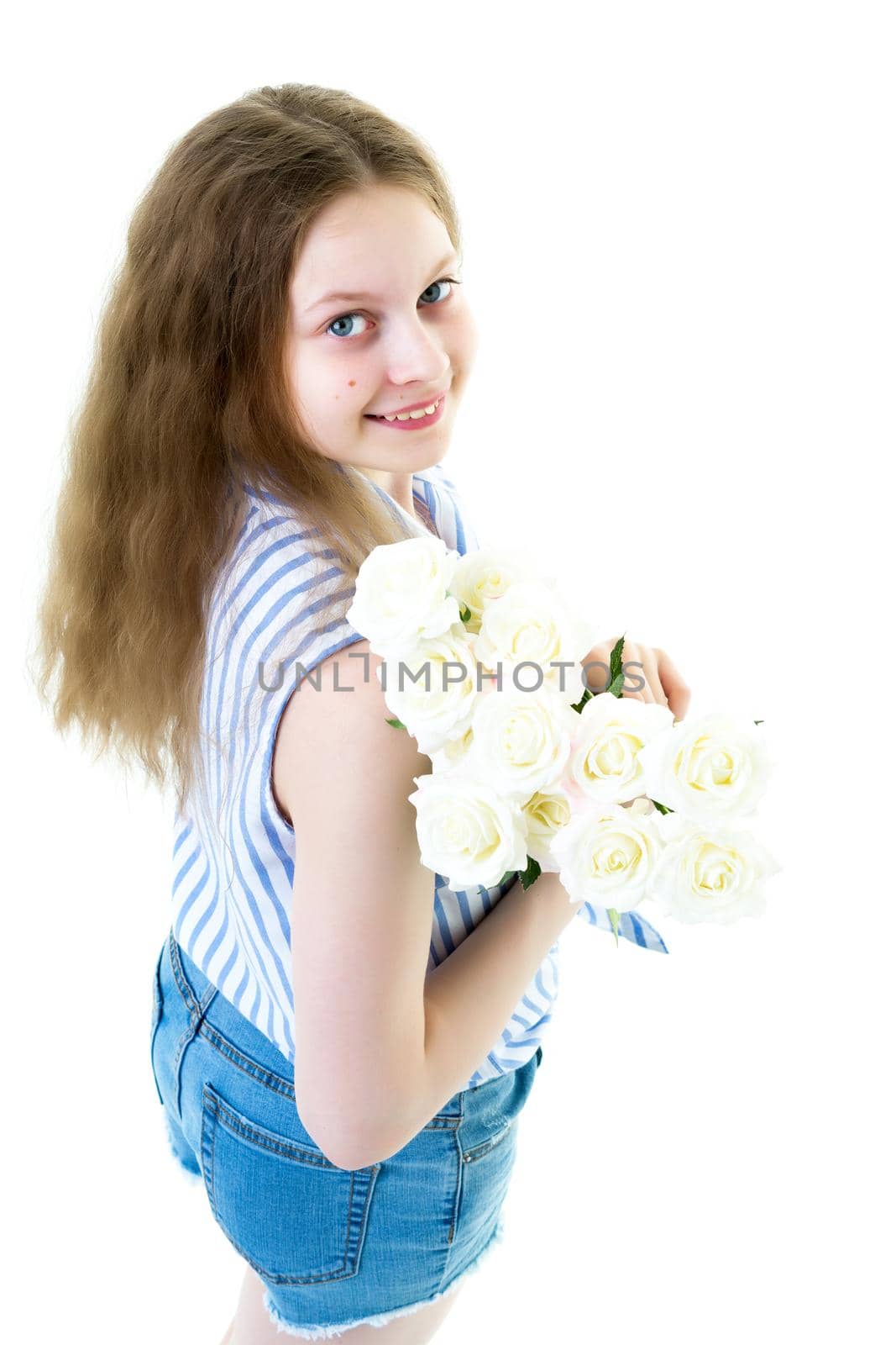 Little girl with a beautiful bouquet of flowers. The concept of holidays, family and children. Isolated on white background.