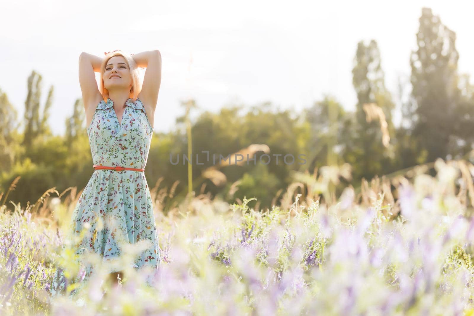 Cute lady walking through the meadow by Andelov13