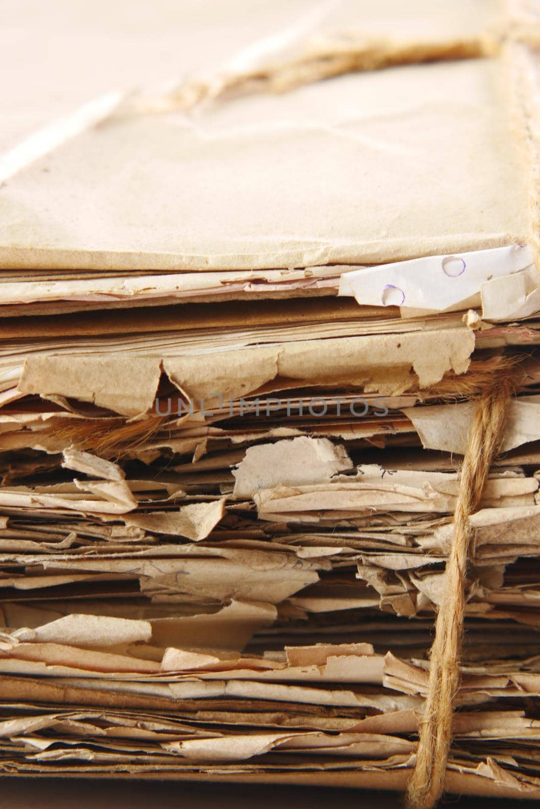 stack of Old papers on table .