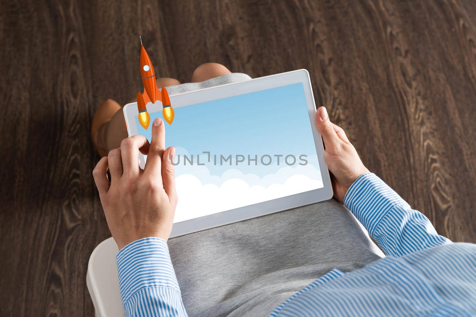 close-up of female hands with a computer tablet. Concept business startup