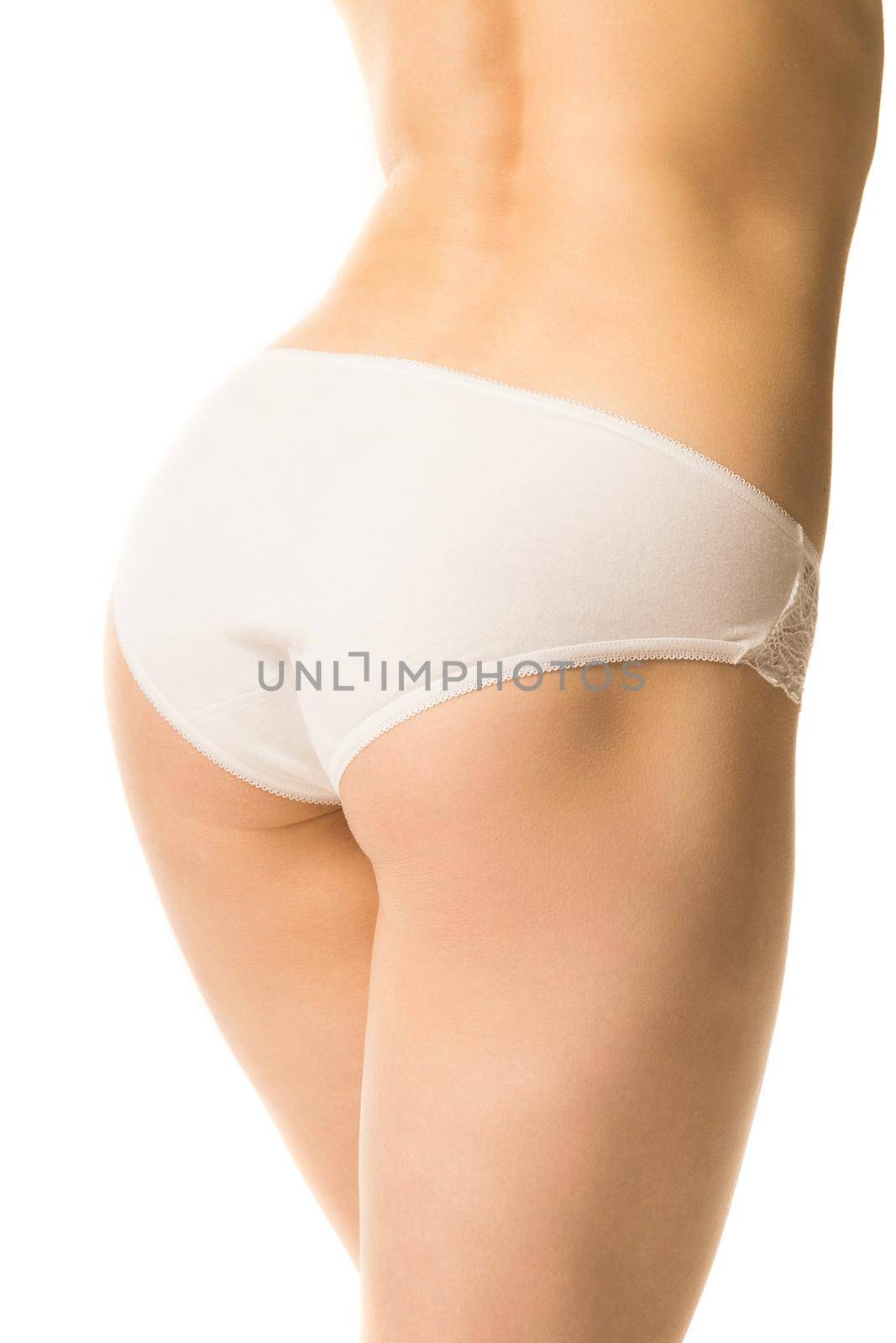 fit girl in panties on a white background, half-length shot by TRMK