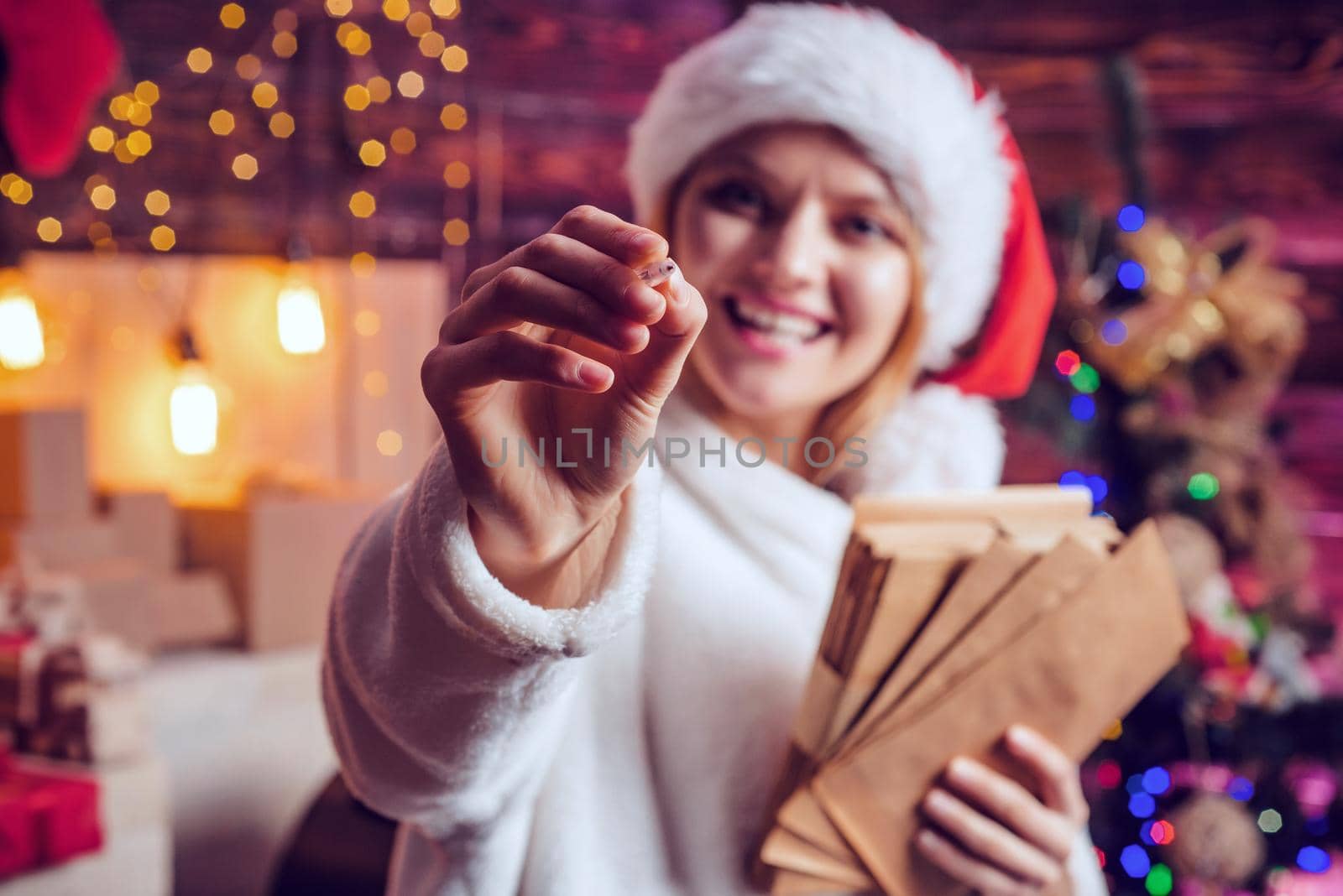 Christmas woman with marker for text. Copy space. by Tverdokhlib