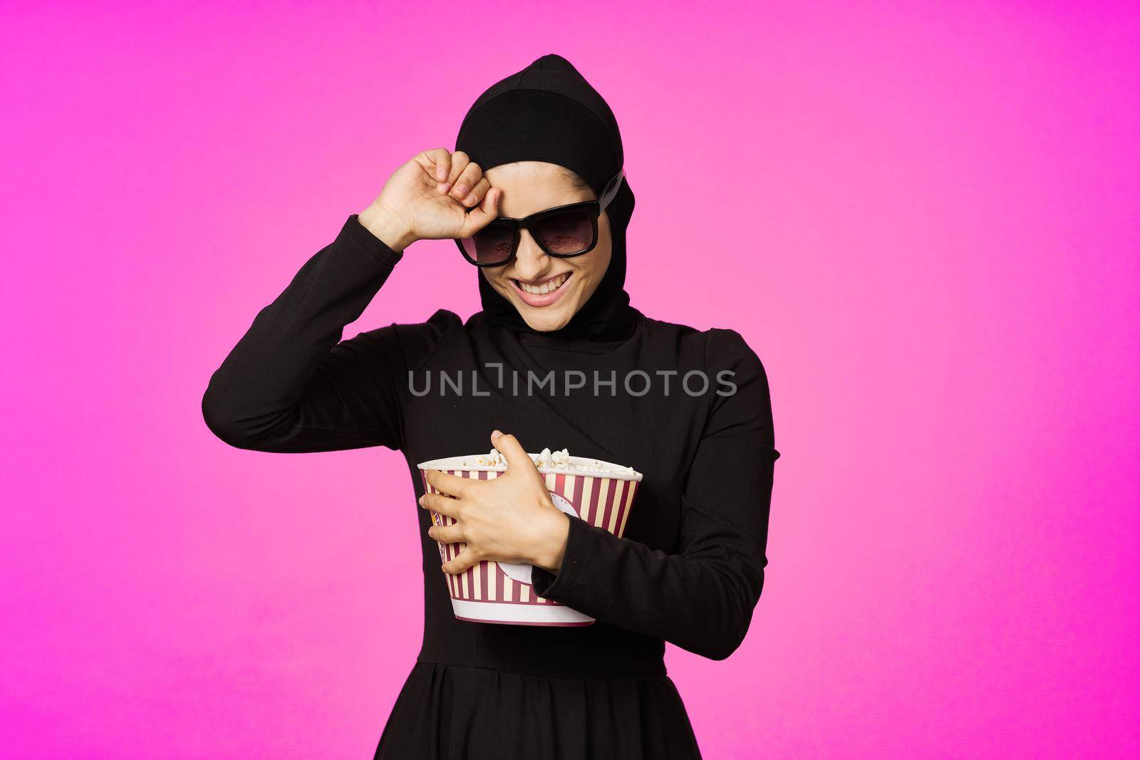 cheerful woman attractive look popcorn glasses movie watching purple background by Vichizh