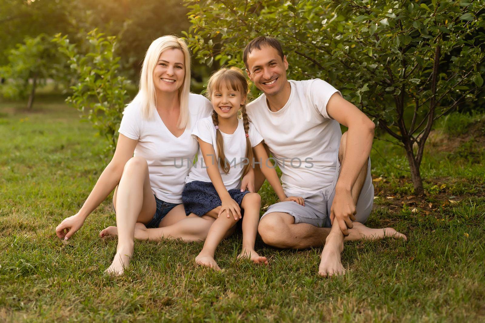 Happy family enjoying in park on sunny a day