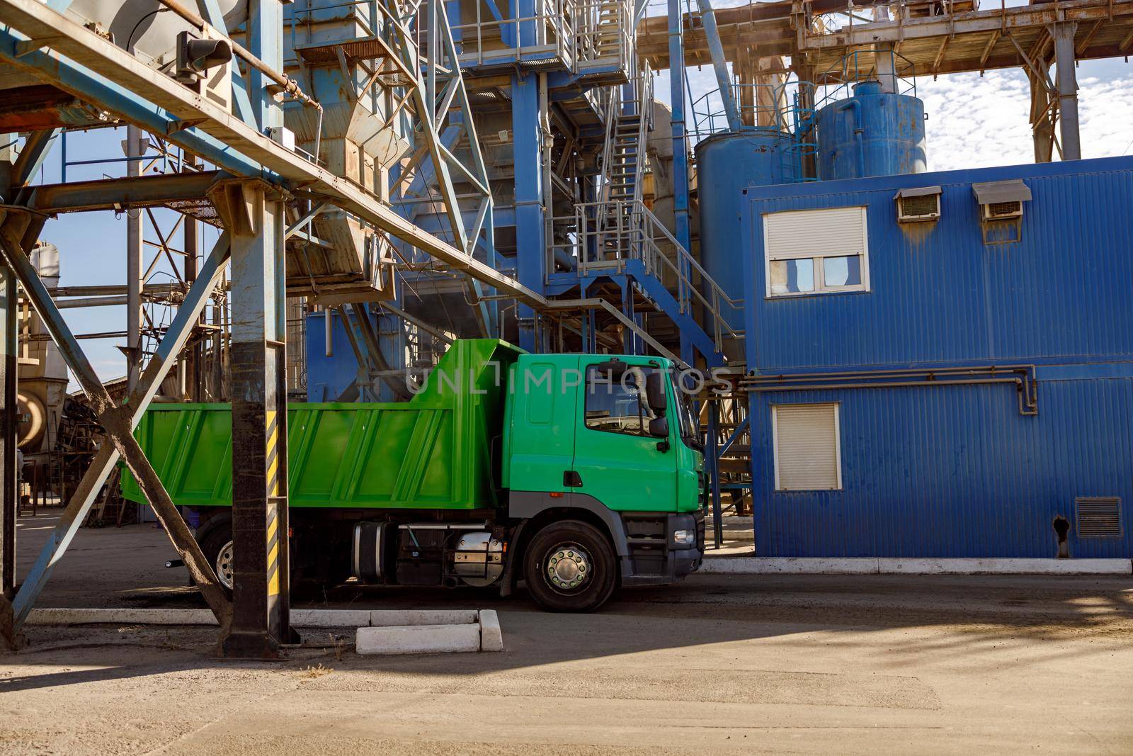 Industrial facilities and truck outdoors at plant by Yaroslav_astakhov