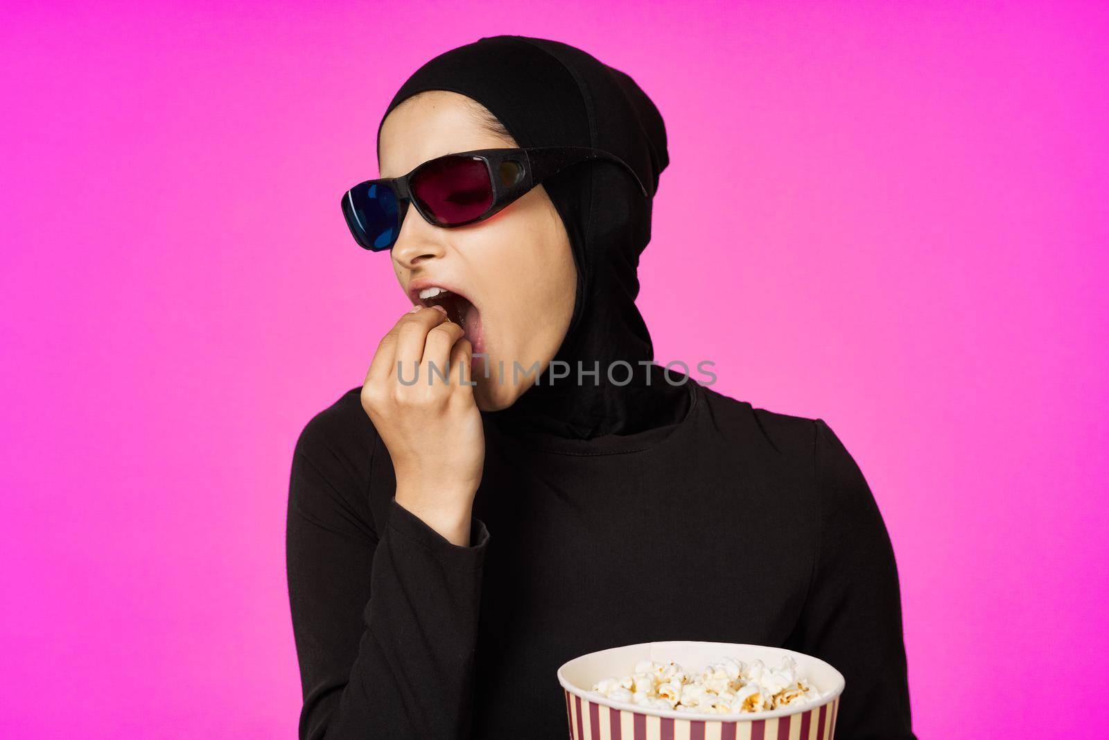 cheerful woman entertainment cinema popcorn fashion model ethnicity. High quality photo