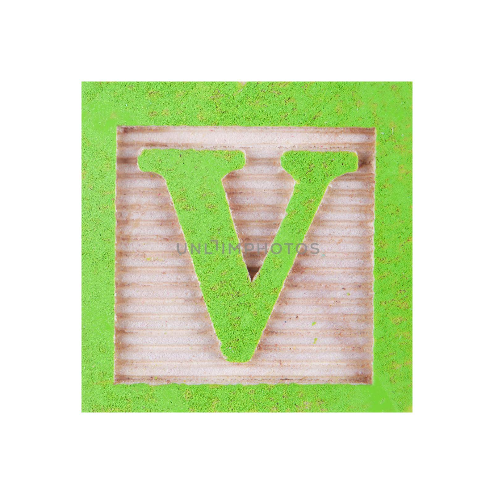 A letter V childs wood block on white with clipping path