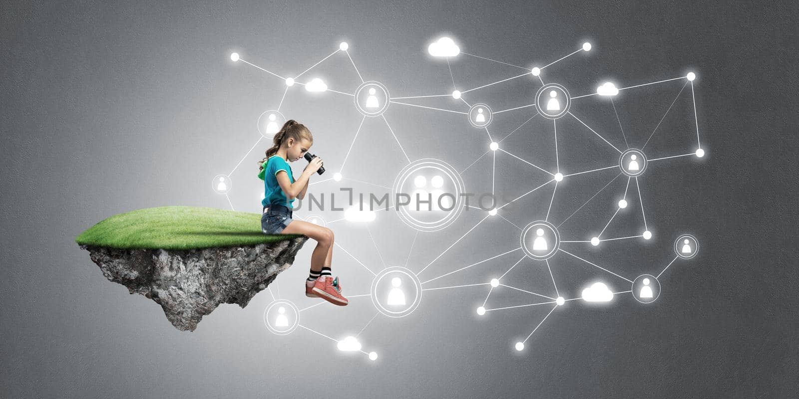 Concept of careless happy childhood with girl looking in binoculars by adam121