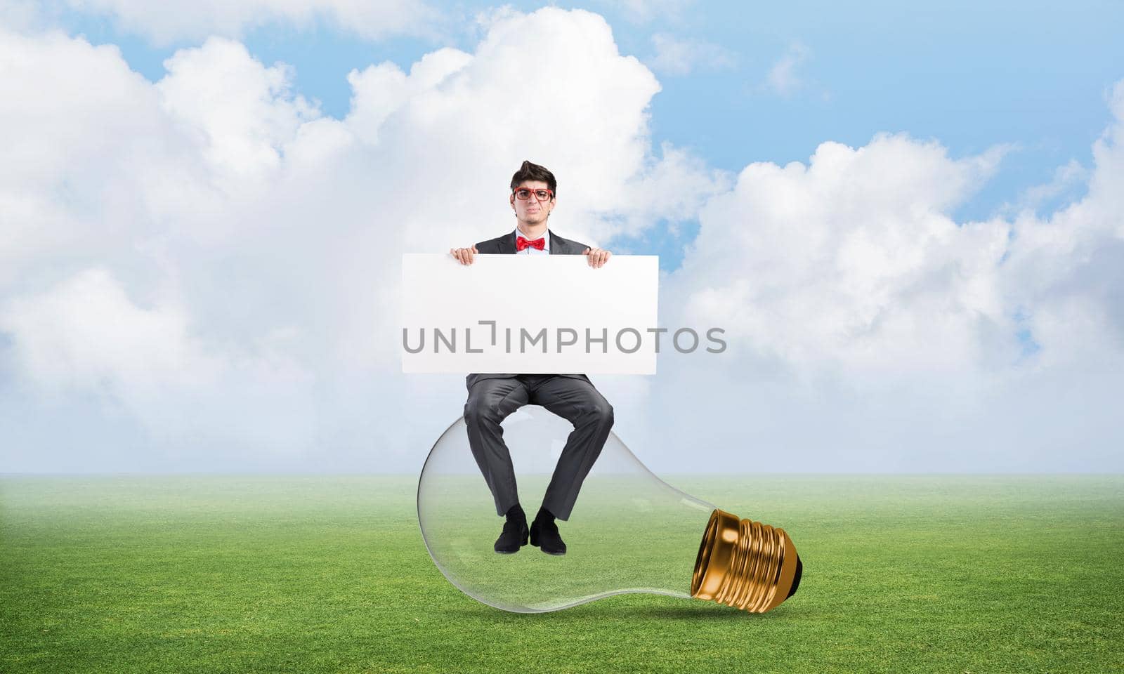 businessman with an empty banner. concept of creativity in business