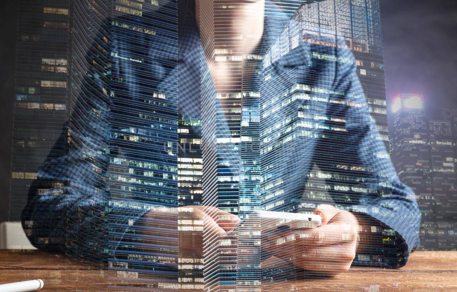 Businesswoman using mobile phone at desk. Close up woman hands and tablet computer. Mobile communication concept with chatting woman. Digital technology in strategy planning and company management