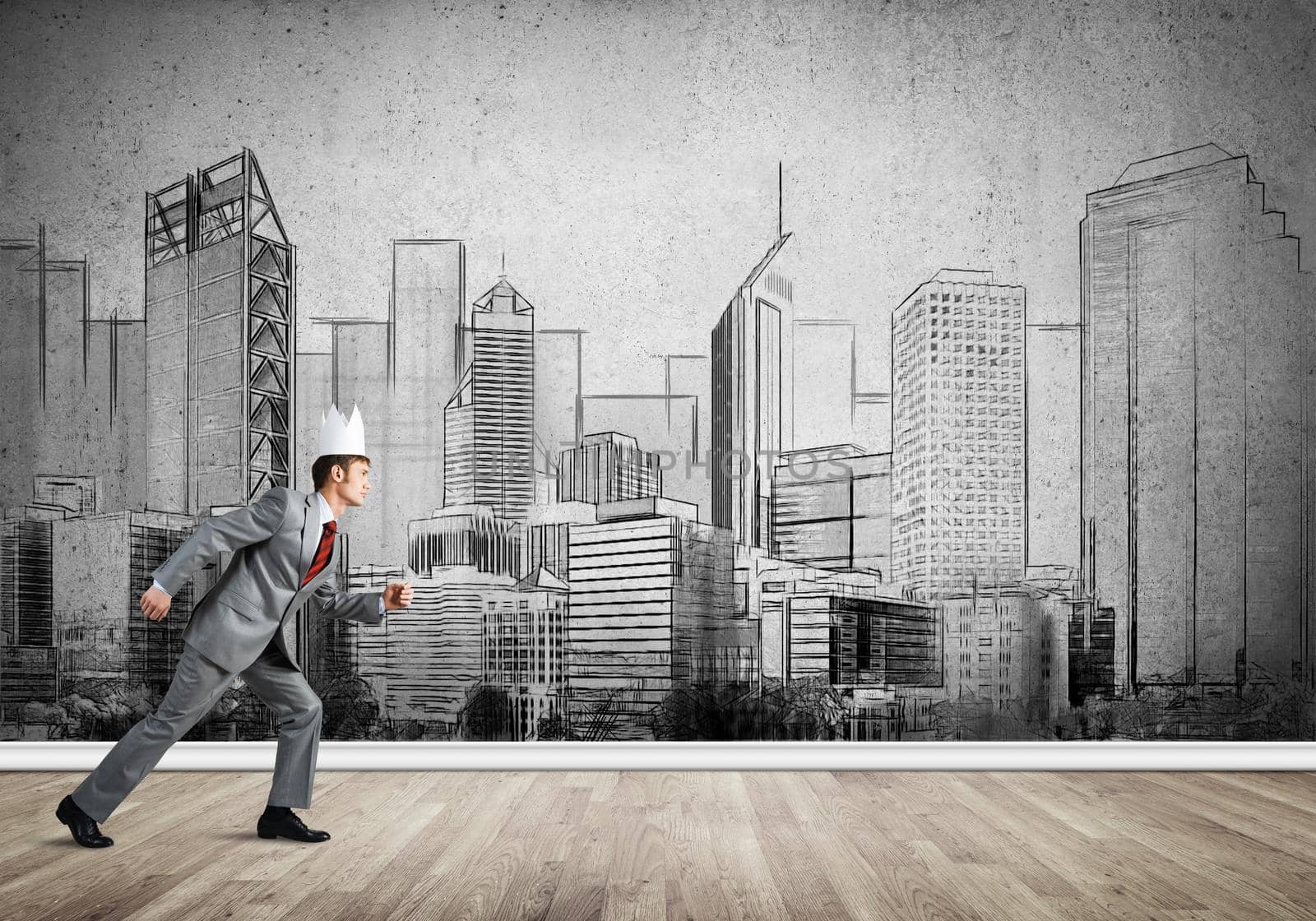 Young handsome businessman wearing white paper crown running in a hurry