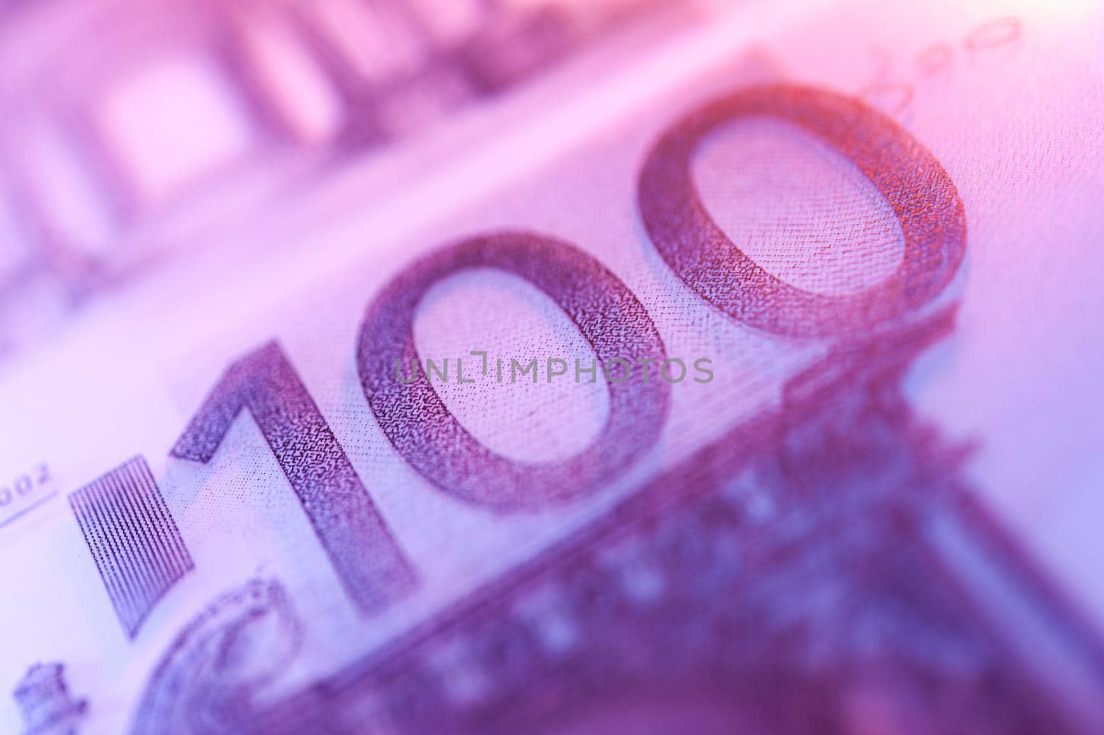 Close-up view of cash money euro bills background. Finance and business concept. Shallow depth of field.