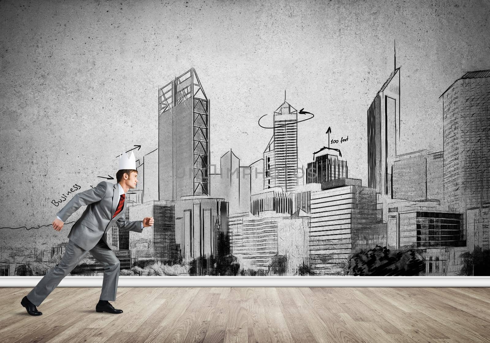 Young handsome businessman wearing white paper crown running in a hurry