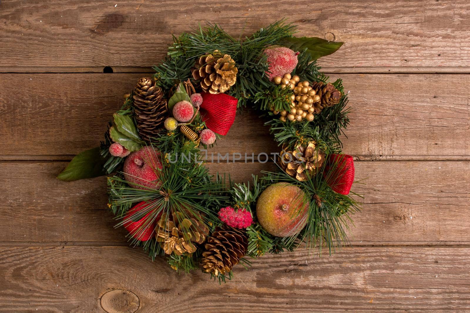 New Year and Christmas mokcup. Xmas lights on wooden background, space for your text, copyspace. from above. Holiday winter planning concept. Flat lay style.