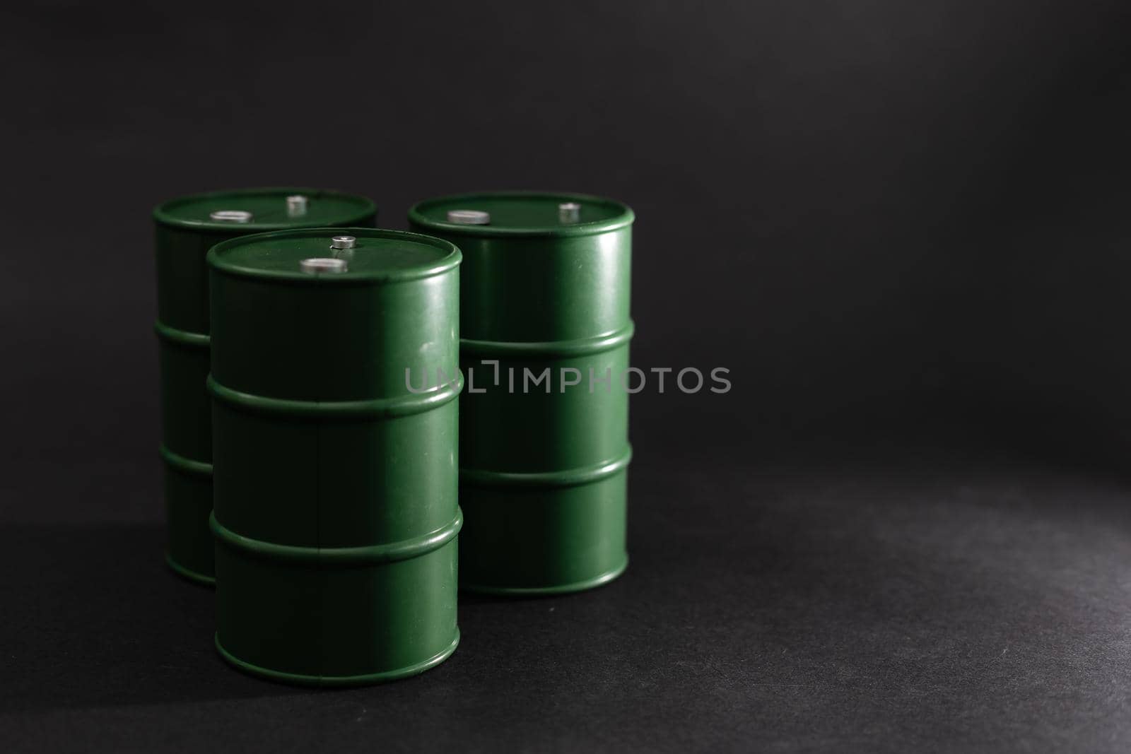 oil barrels on black background.