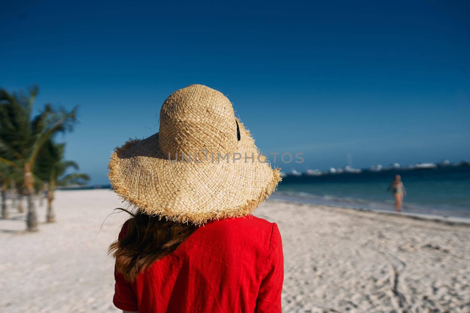 woman in hat on island landscape summer tropics. High quality photo