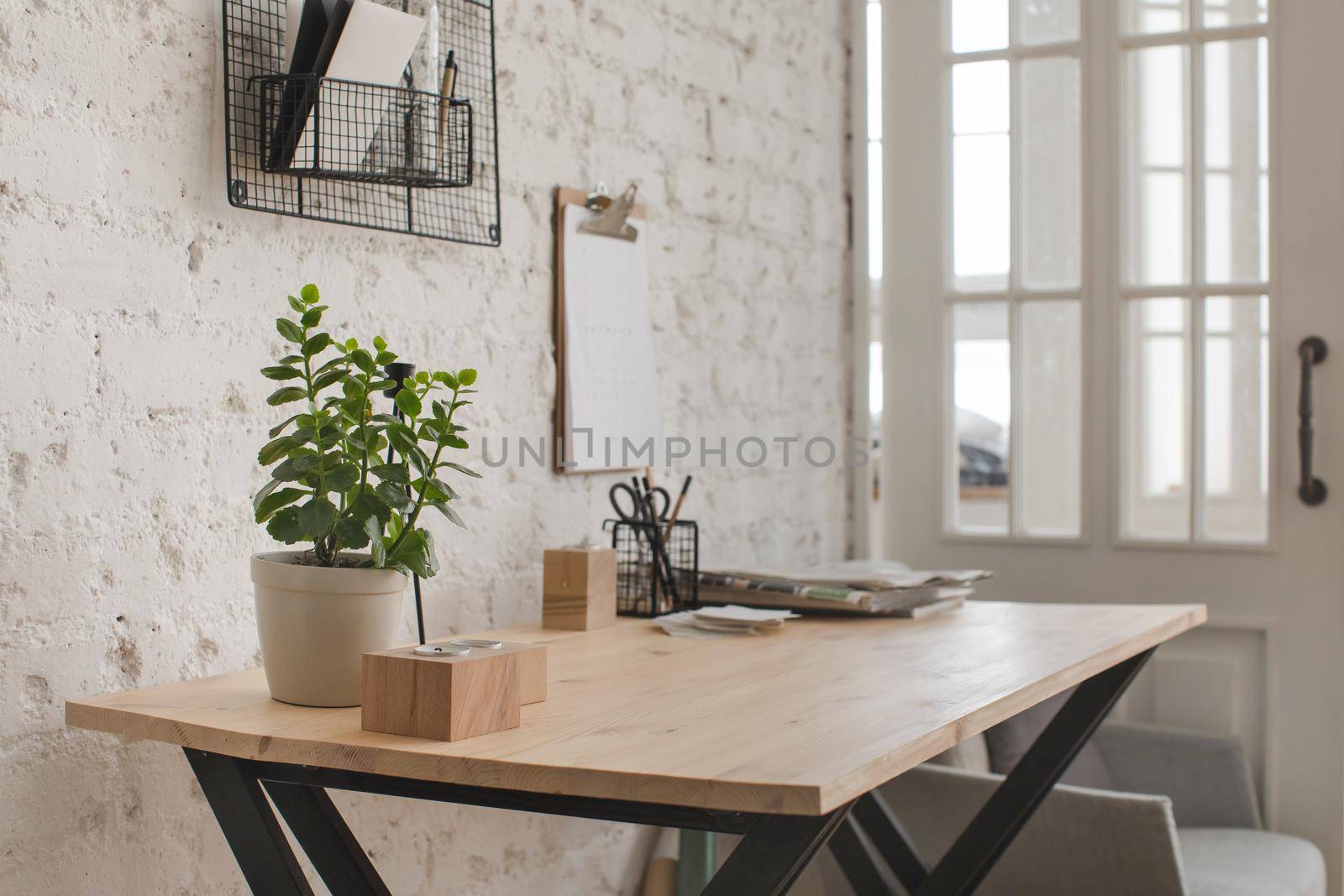 Wooden working table in home office by Demkat