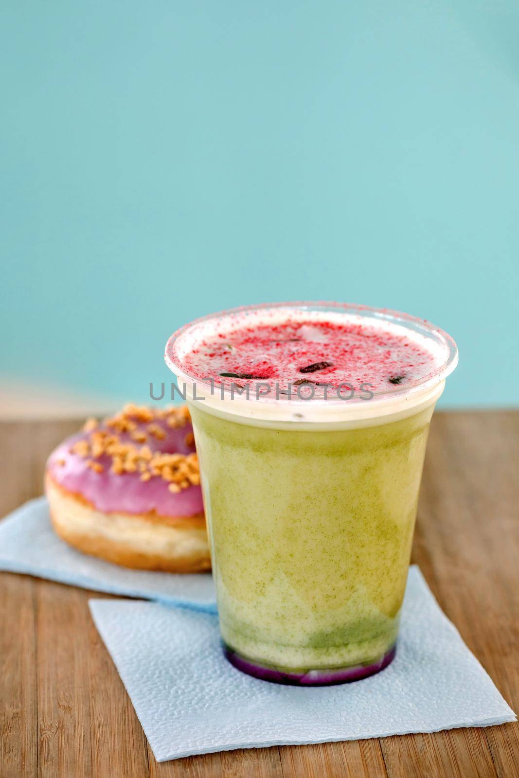 Green tea matcha smoothies in a plastic cup by Demkat