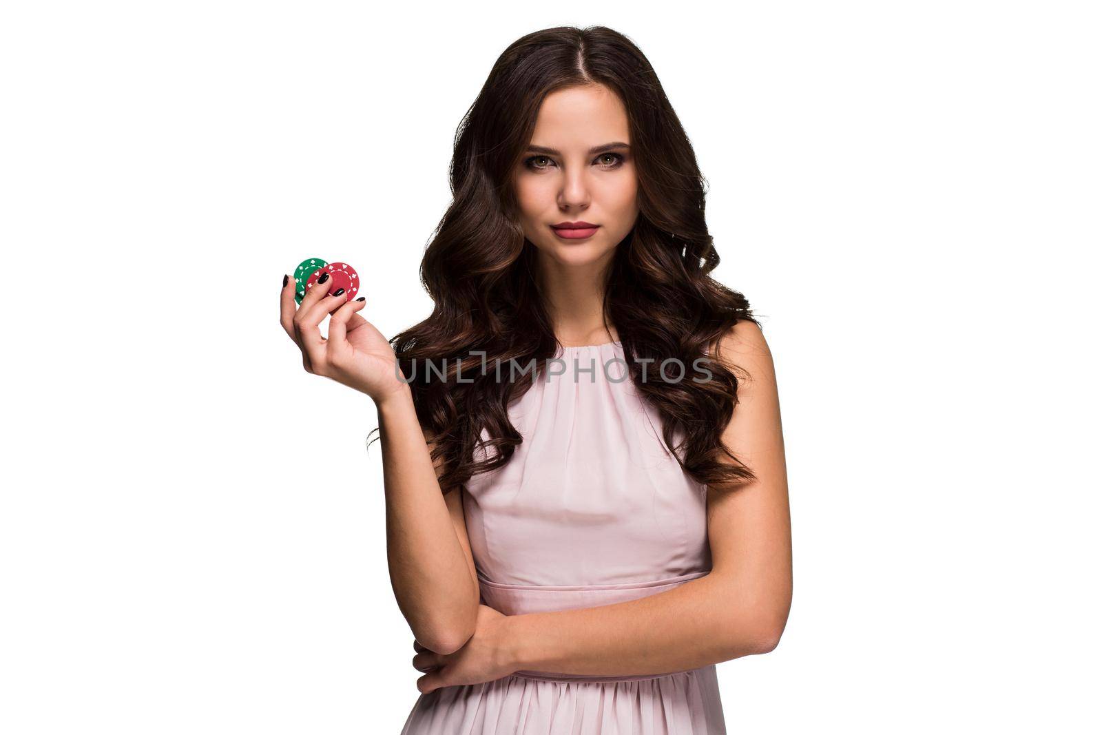 Sexy curly hair brunette posing with chips in her hands, poker concept isolation on white background Casino, poker, Roulette Blackjack Spin. Big win emotions