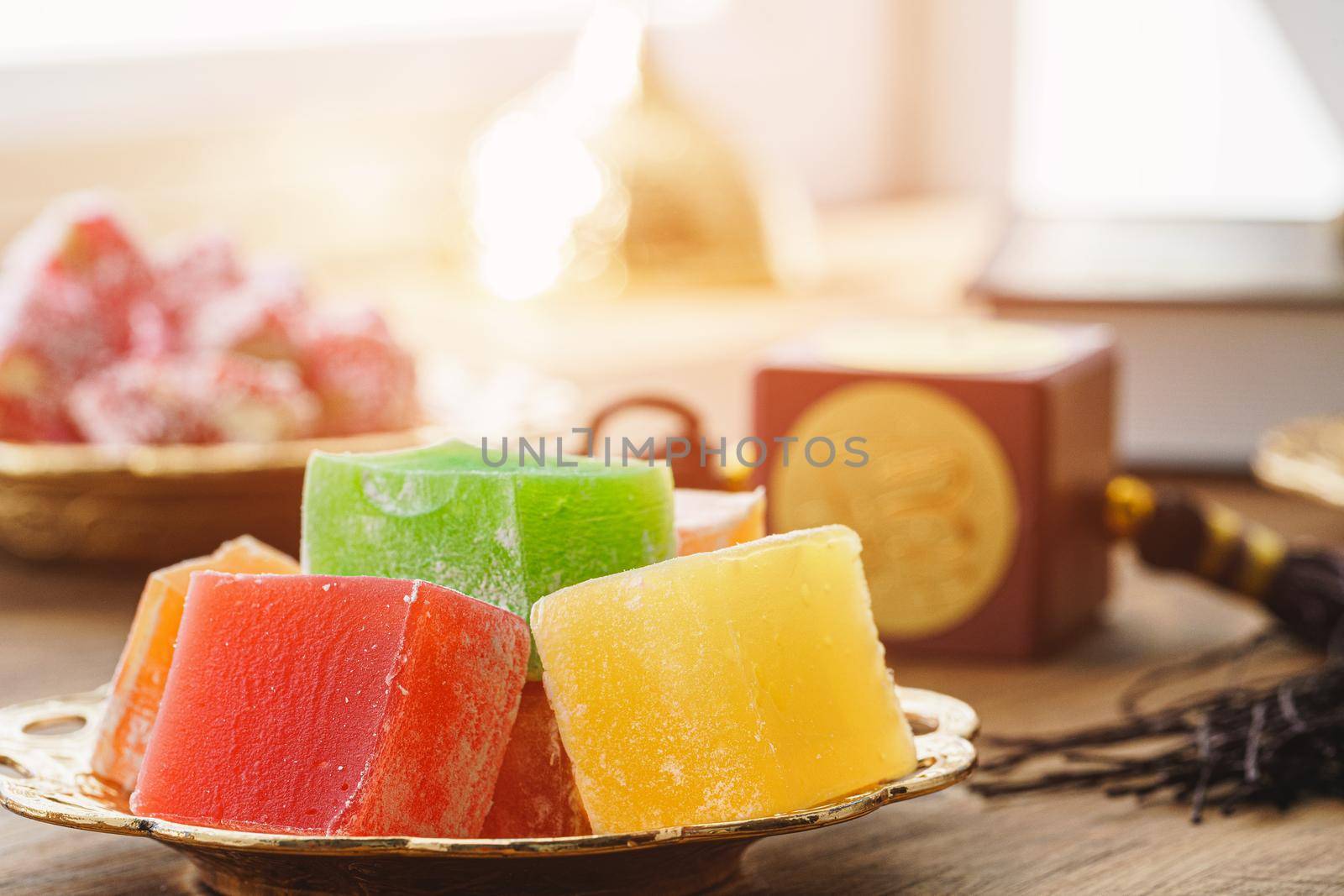 Turkish delight sweets on a metal oriental plate close up