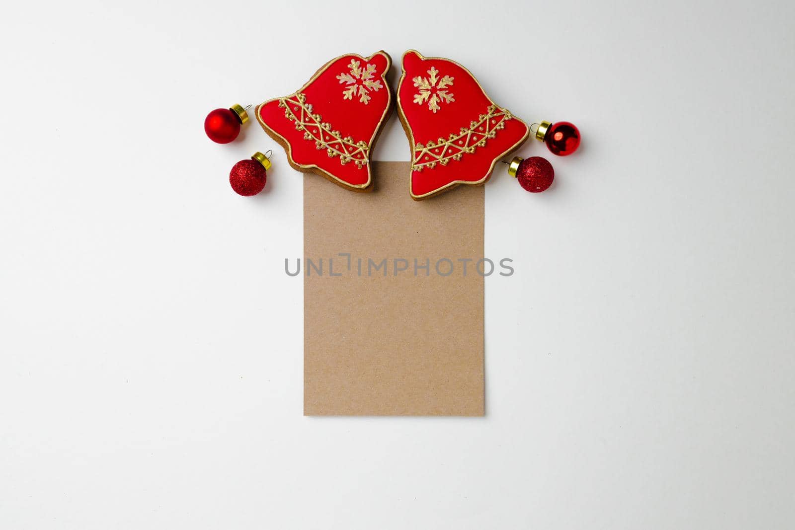 Blank paper and gingerbread Christmas cookie top view copy space