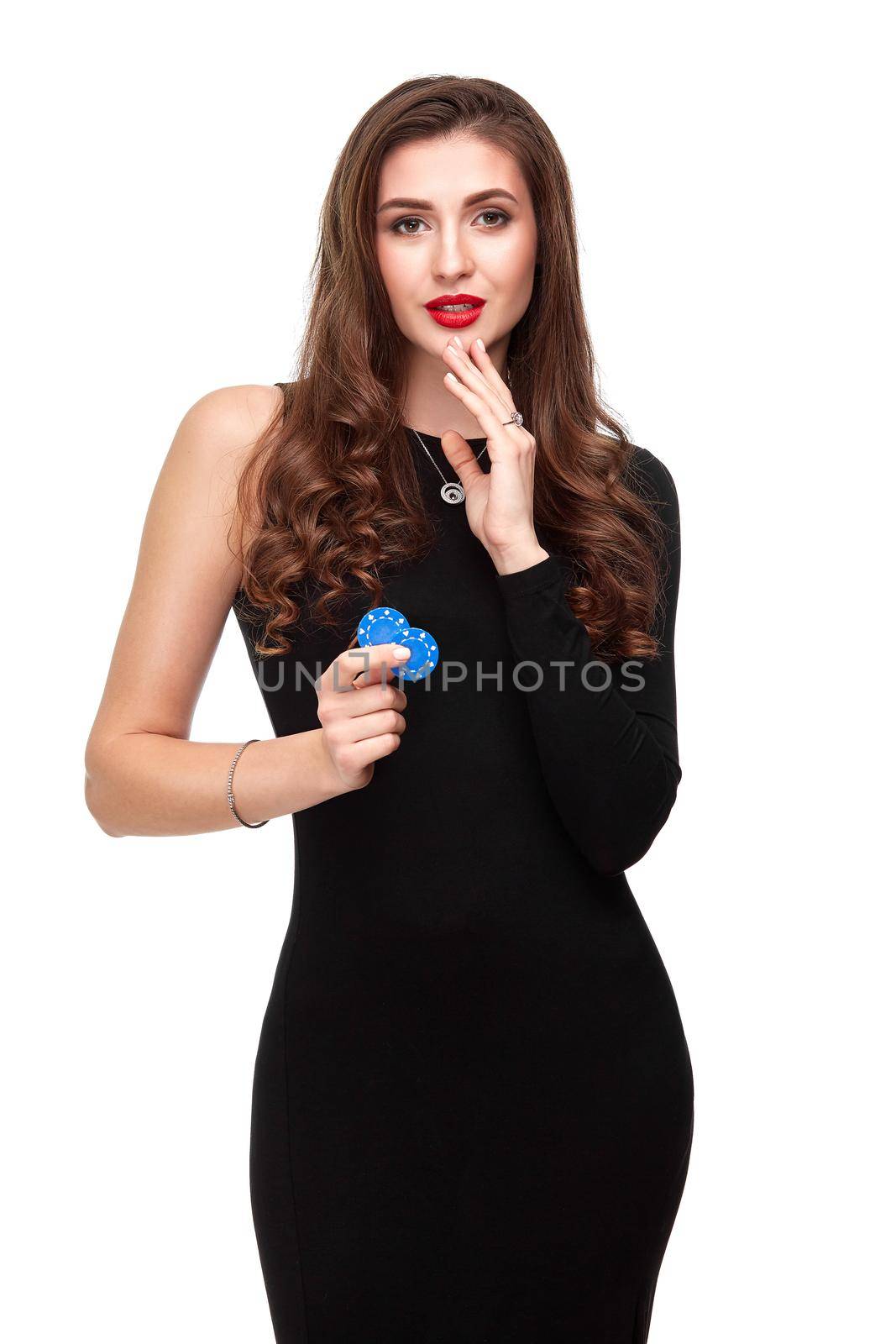 Sexy curly hair brunette in black dress posing with chips in her hands, poker concept isolation on white background Casino, poker, Roulette Blackjack Spin.