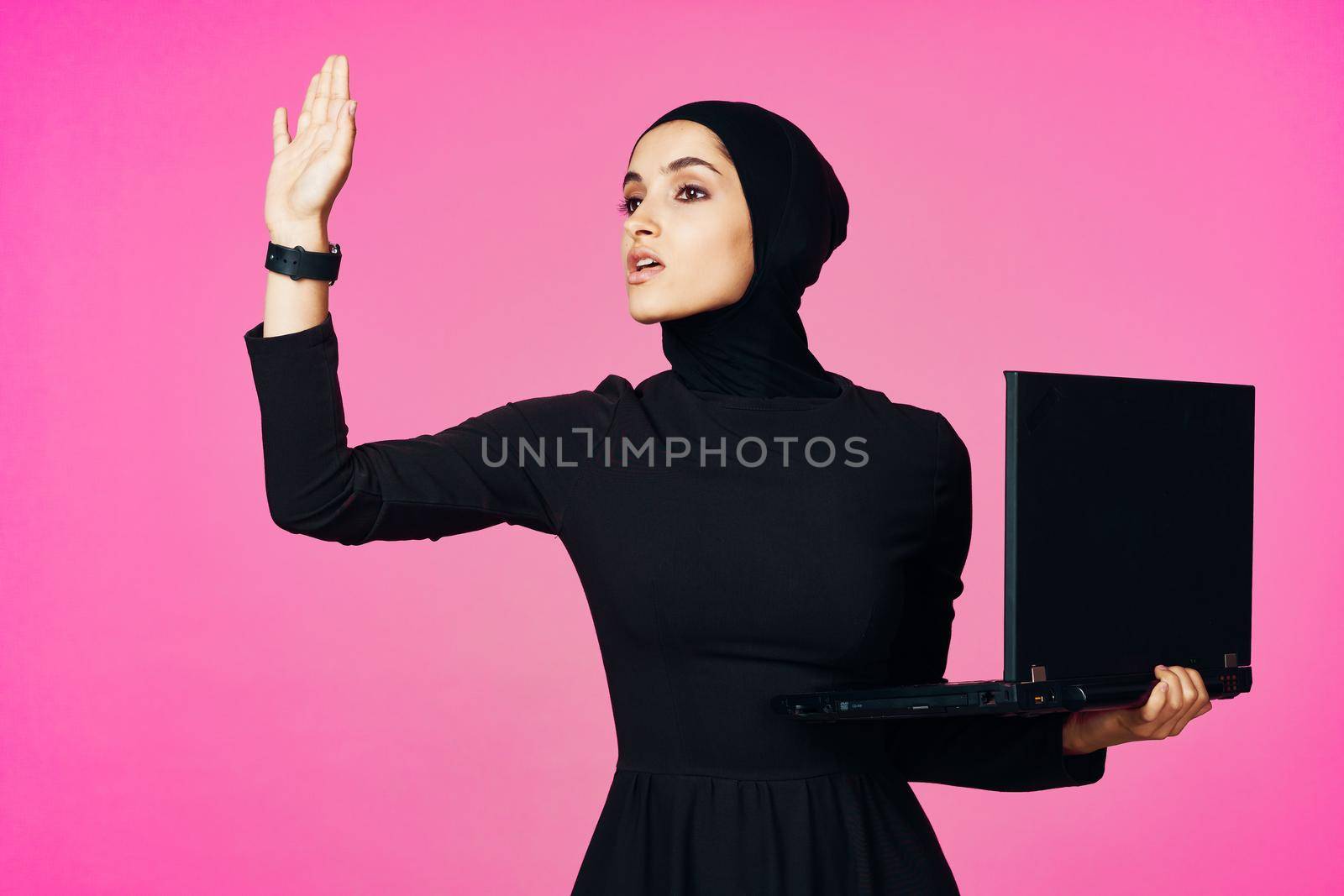 cheerful muslim woman with laptop education student internet technology by Vichizh