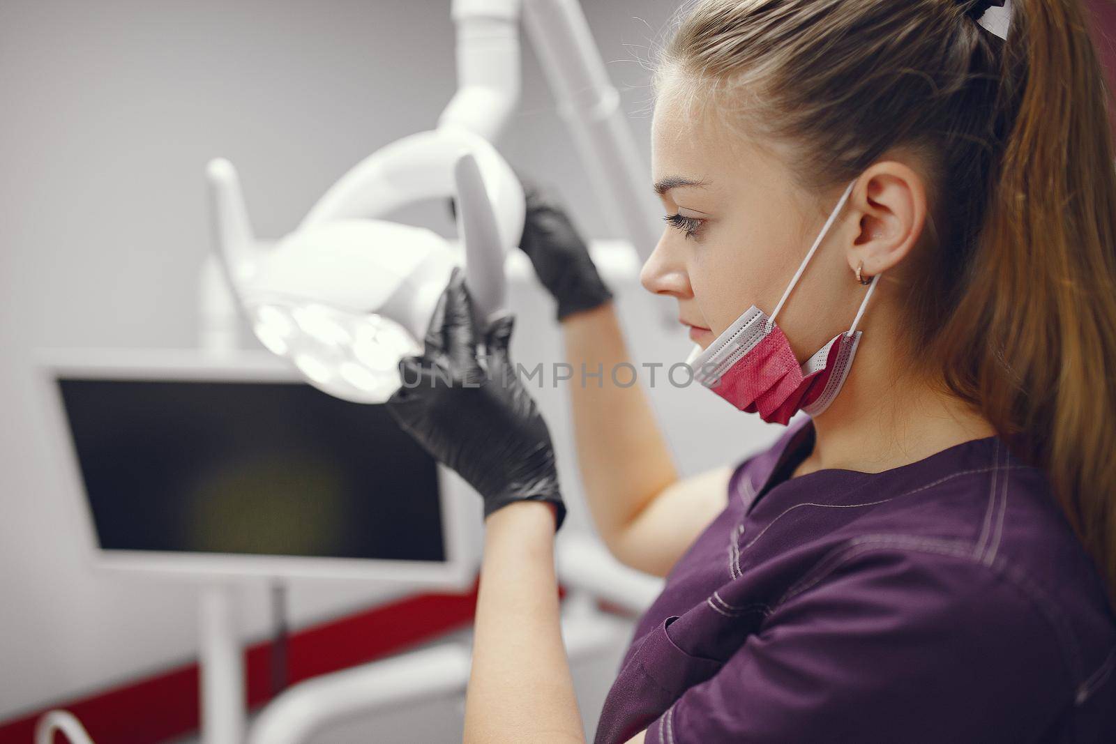 Woman dentist. Doctor working at the clinic