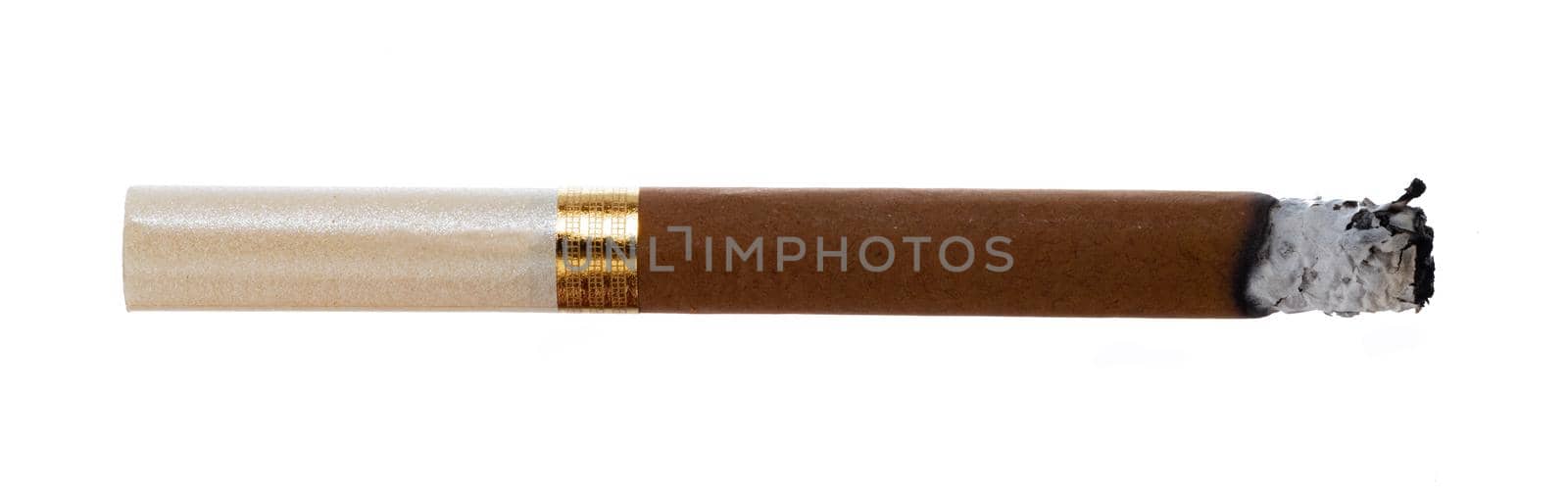 Lit brown cigarette isolated on white background close up