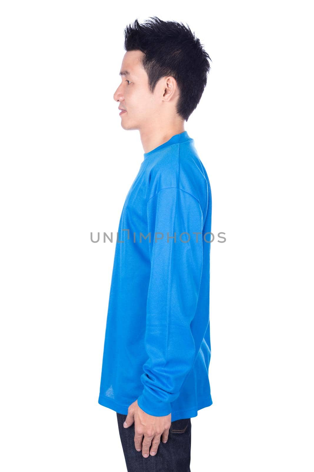 man in blue long sleeve t-shirt isolated on a white background (side view)