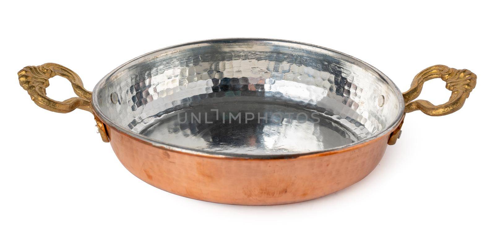 Copper cooking pan isolated on white background close up