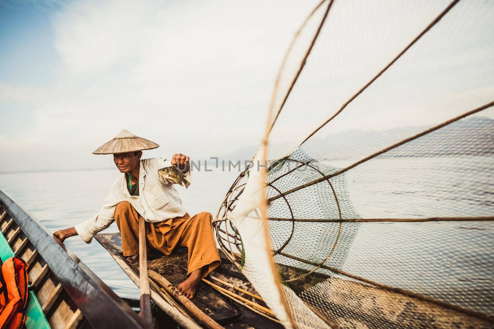 Inle Lake fishermen at sunset in Myanmar Burma. High quality photo