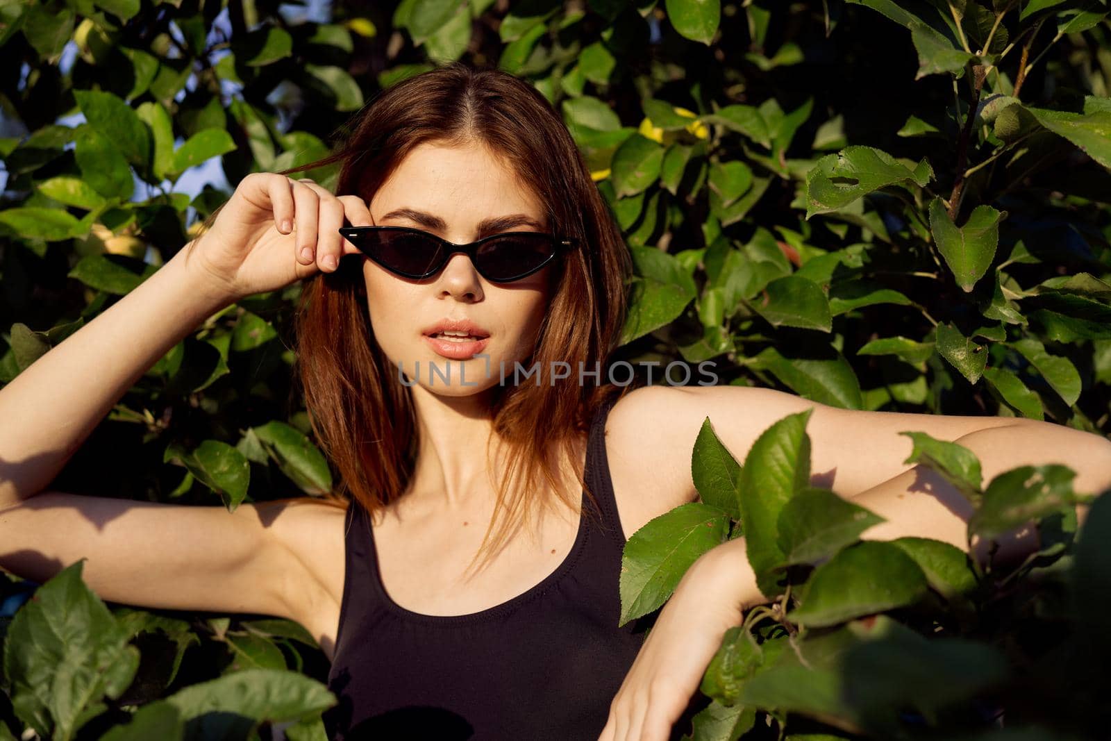 pretty woman posing outdoors in sunglasses glamor summer by Vichizh
