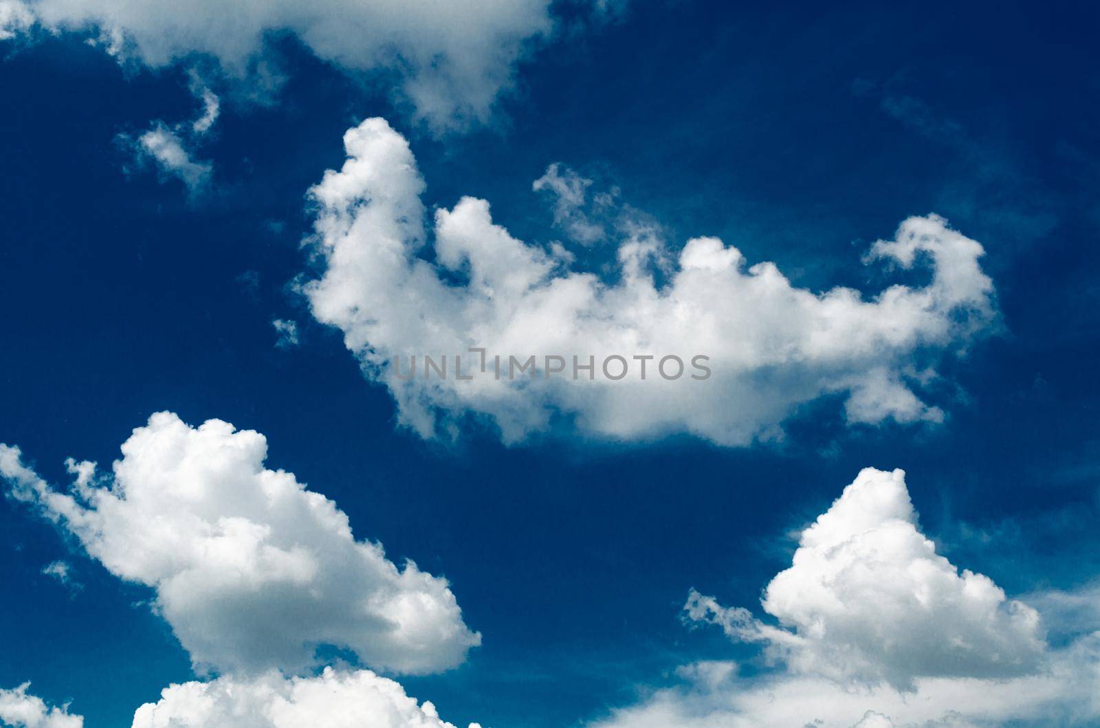 Incredibly wonderful lush cumulus clouds against a blue sky - Image