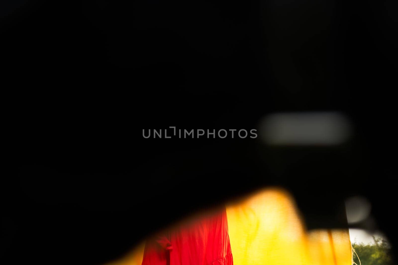 beautiful woman posing in red dress outdoors yellow cloth by Vichizh