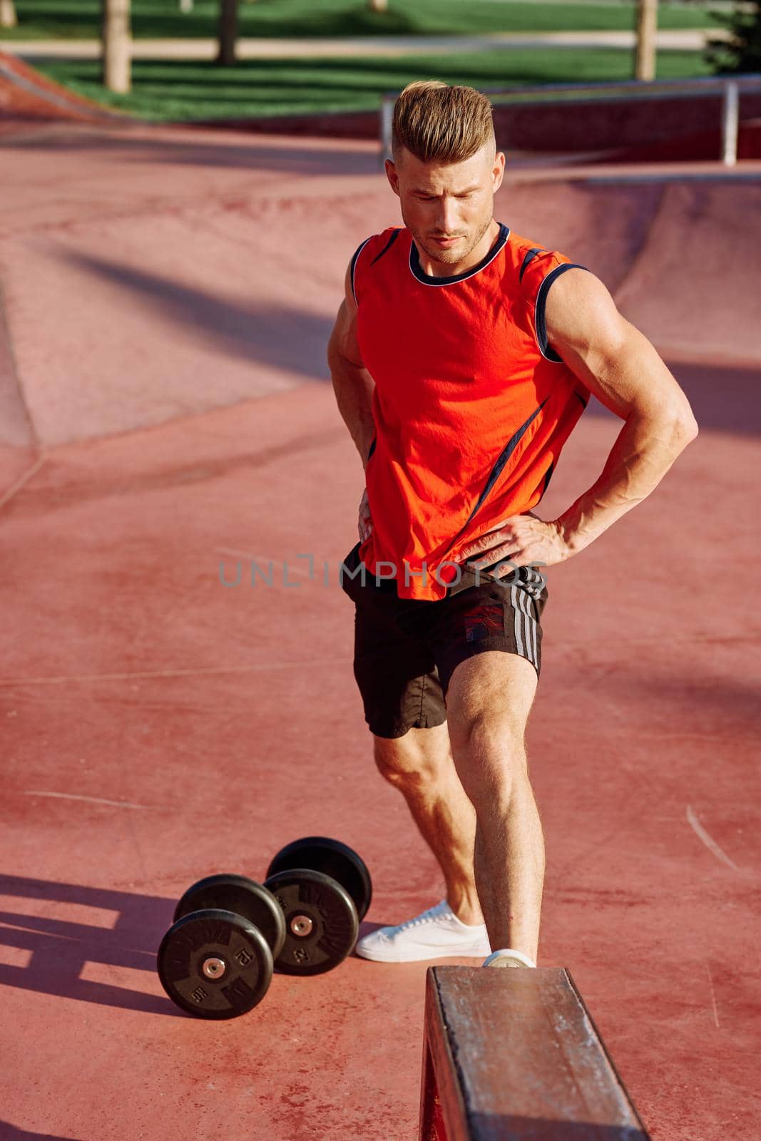 sporty man workout outdoors playground lifestyle. High quality photo