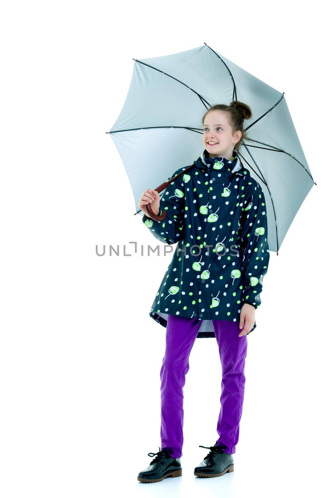 Beautiful little girl with umbrella. Concept of weather, climate change. Isolated on white background