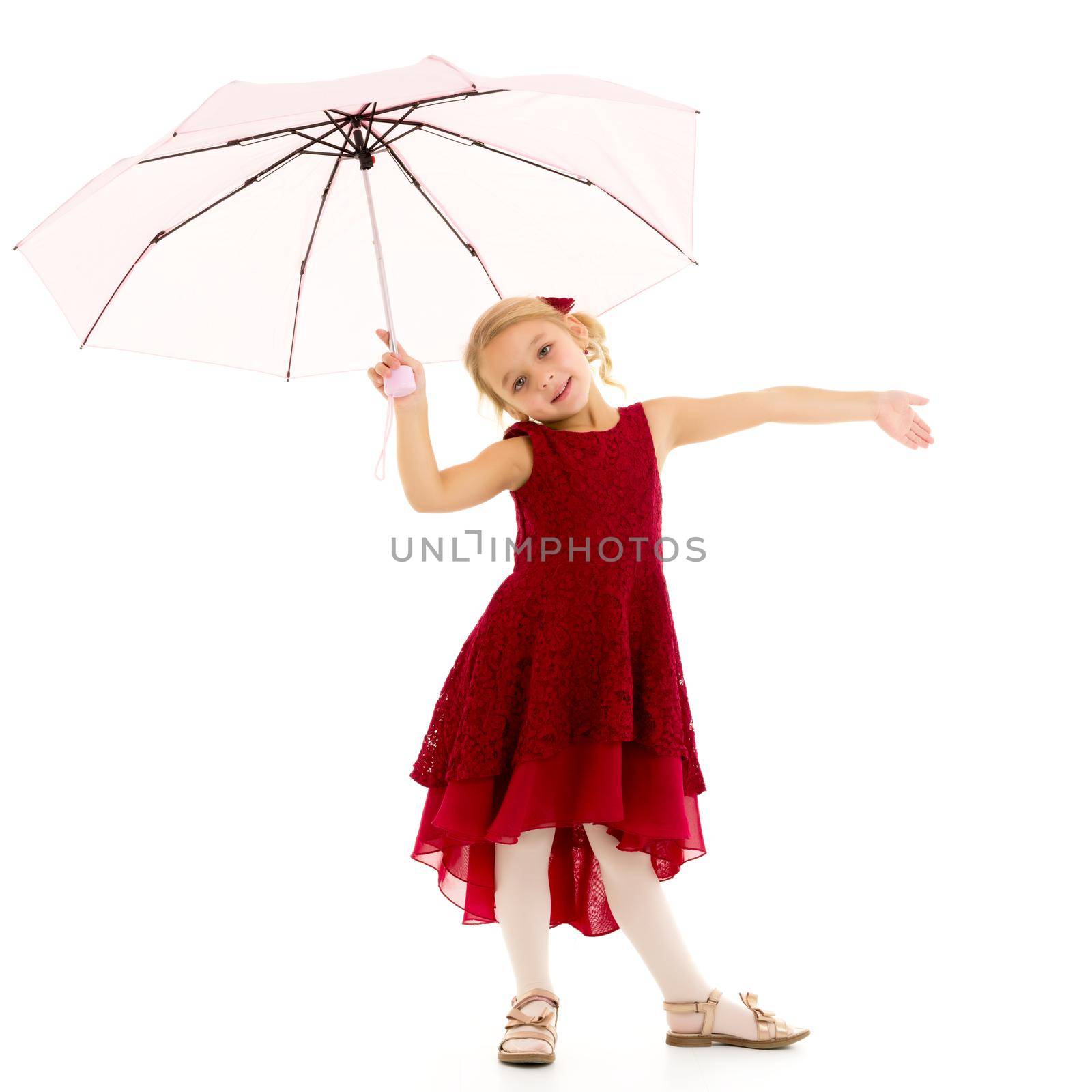 Little girl under an umbrella.Concept style and fashion. Isolated on white background. by kolesnikov_studio