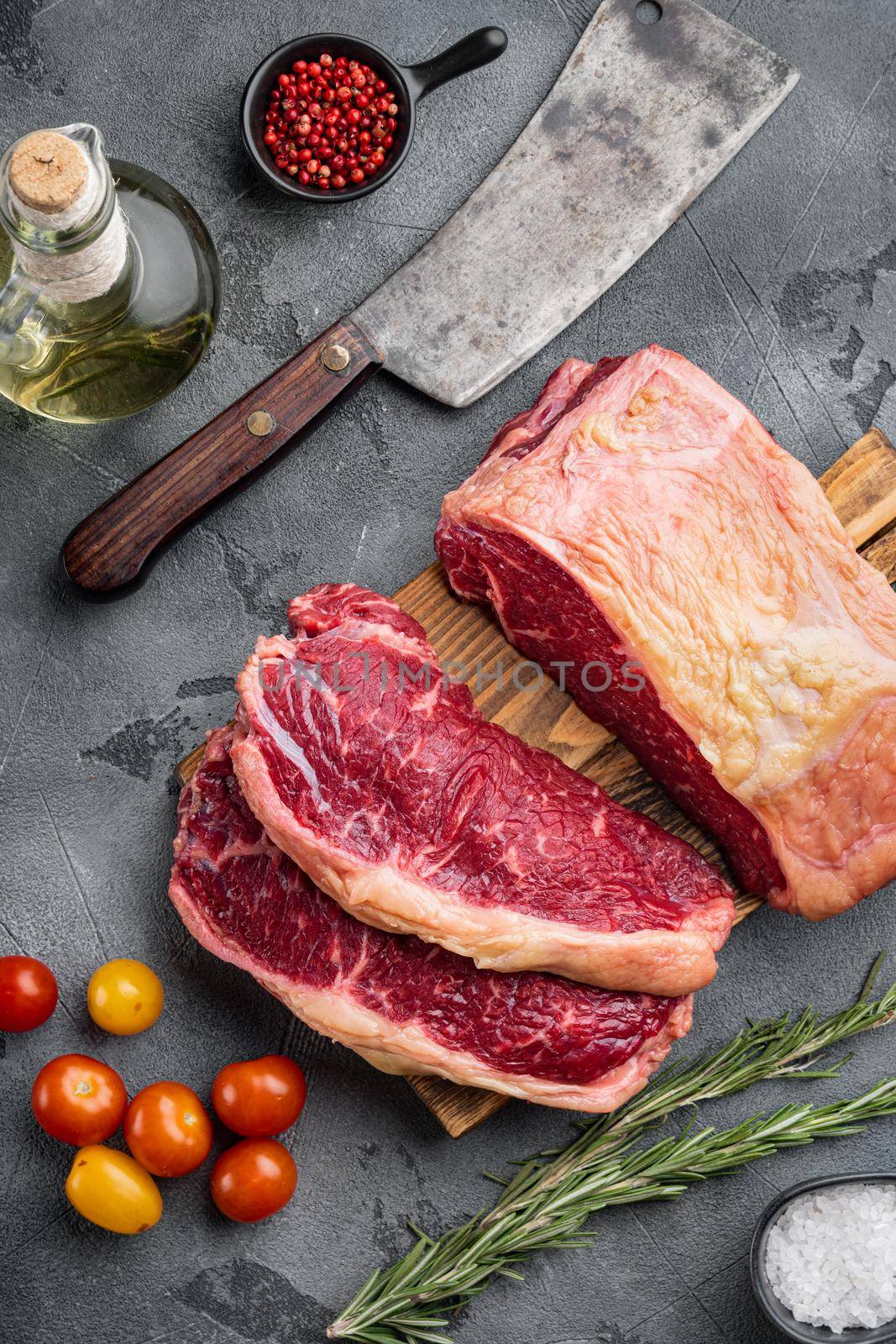 Fresh beef boneless club raw steak, on gray background, top view