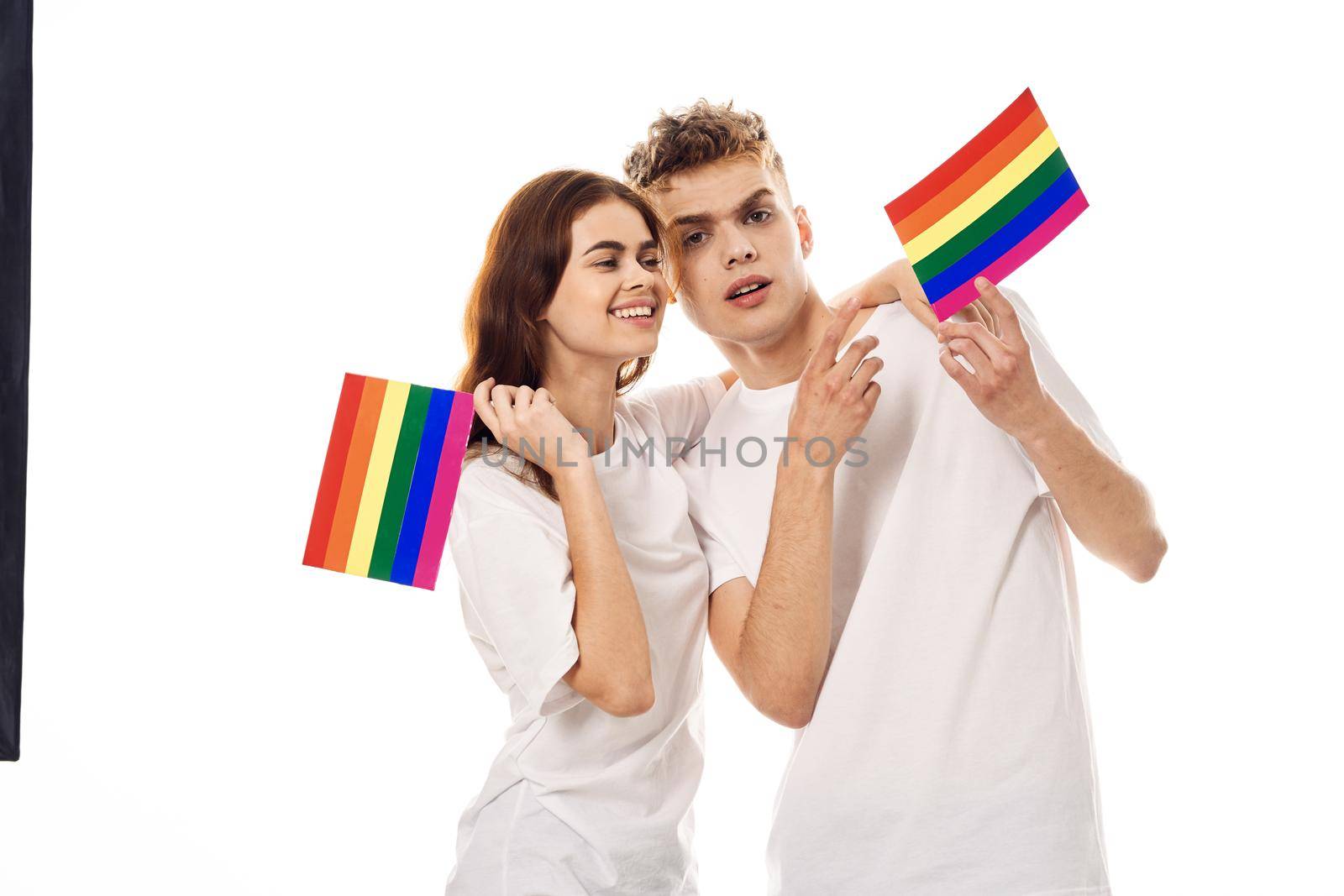 couple in white t-shirts Flag lgbt transgender sexual minorities. High quality photo